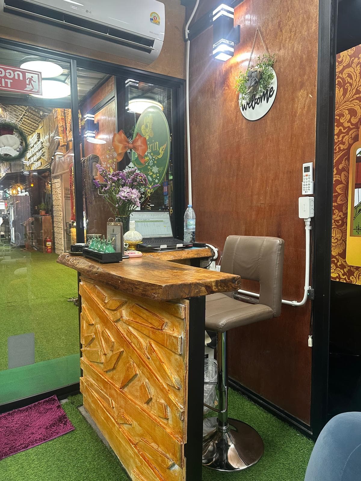 Reception desk with welcome sign