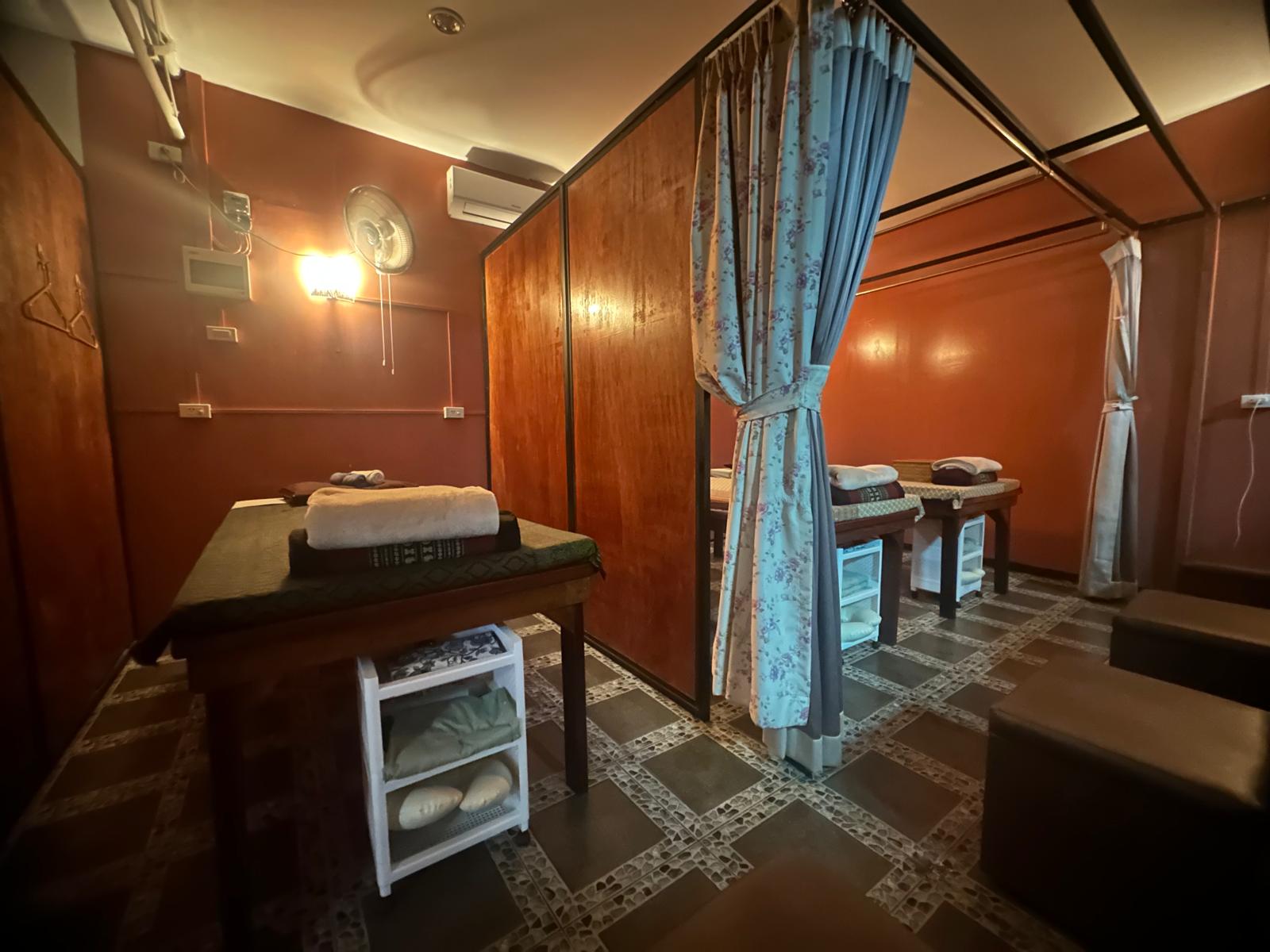 Private treatment room with traditional Thai decor
