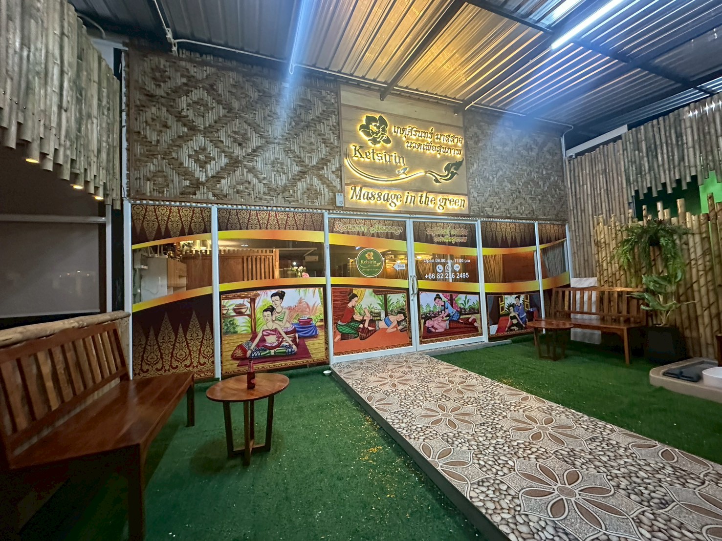 Exterior of Ketsirin Massage in the Green, Nai Thon with traditional Thai artwork and bamboo decor