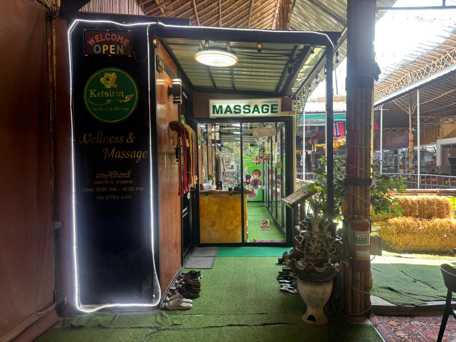 Exterior of Ketsirin Wellness & Massage Bang Tao with illuminated signboard and welcoming entrance