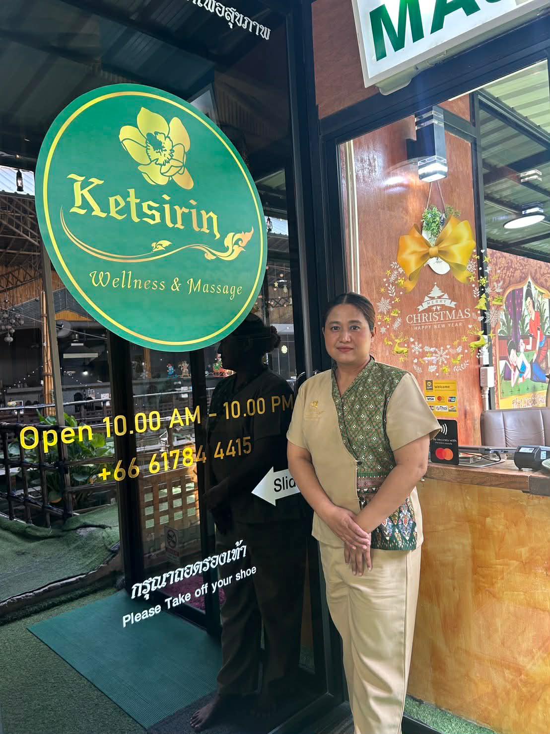 Thai massage therapist at Ketsirin Wellness & Massage Bang Tao entrance